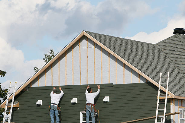 Professional Storm Damage Siding Repair technician working in Dublin, TX